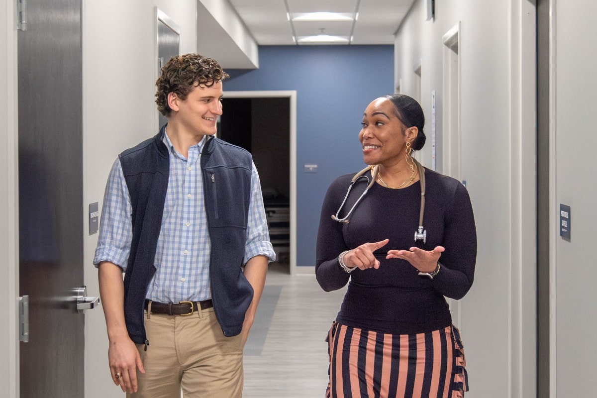 Vitalcare-family-practice-andrea-mayo-with-patient Applause