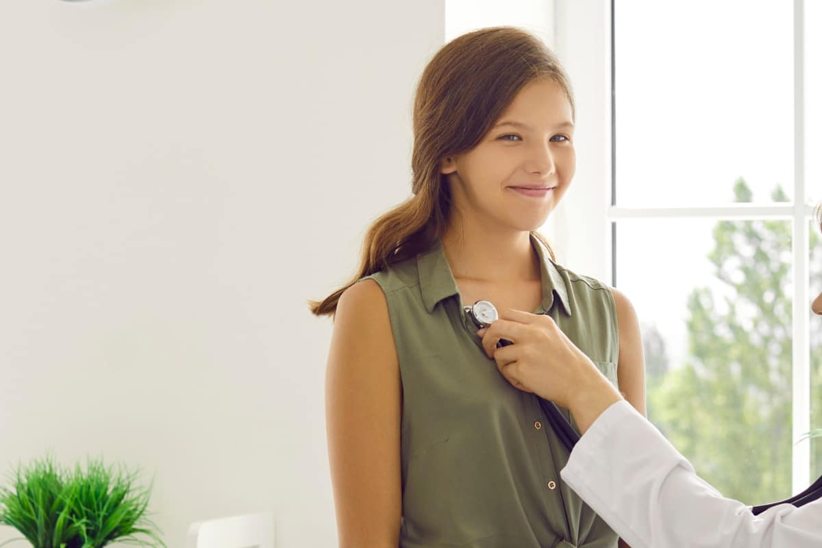 Vitalcare-pediatrics-teen-girl Teen girl at doctor