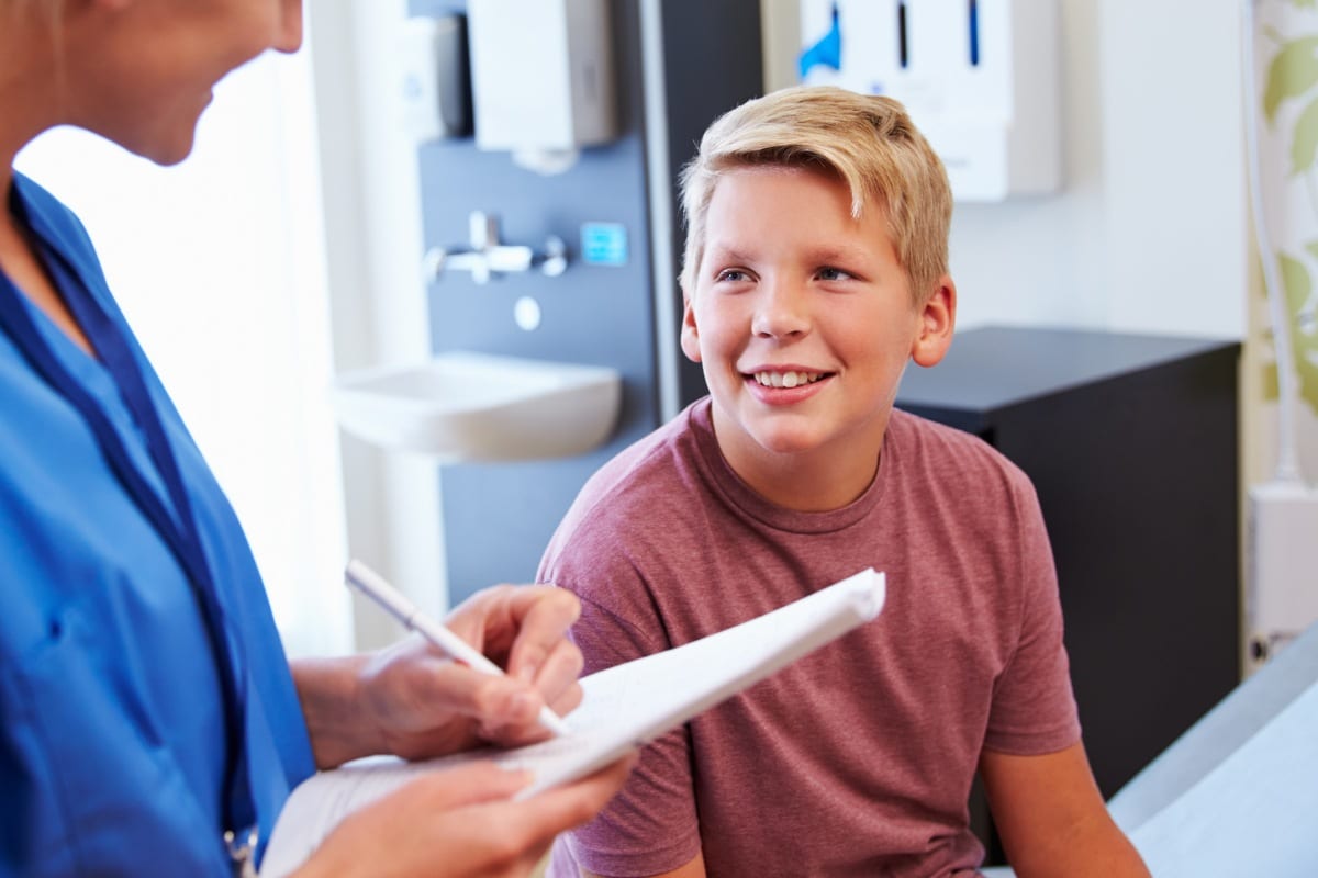Vitalcare-pediatrics-teen Teen boy at doctor
