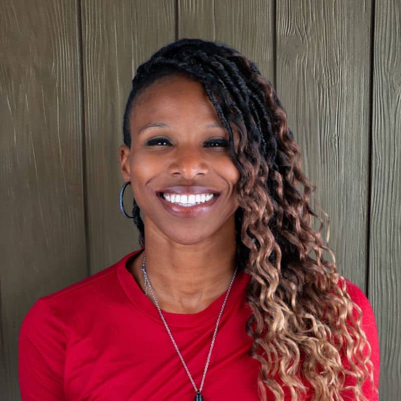 Chronic care manager at vitalcare family practice Headshot of chronic care manager wearing a red shirt at vitalcare family practice